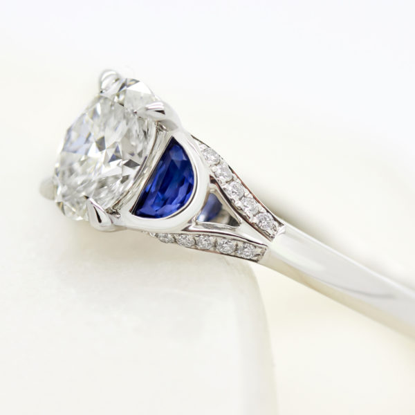 blue sapphire half moon side stones